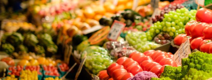 fruit and vegetable stand at Pike Place market Photo Credit Thomas Le